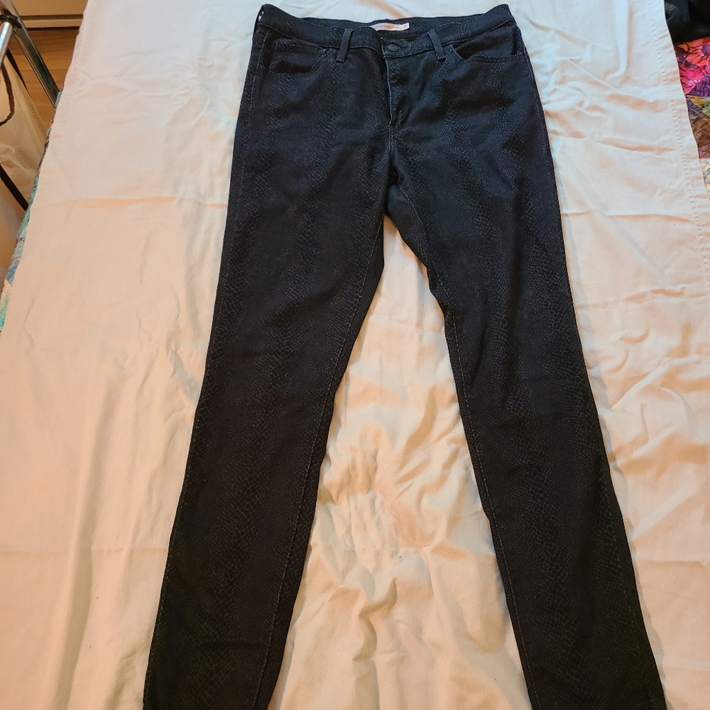 Levi's Snakeskin Print High-Rise Super Skiny jeans.
